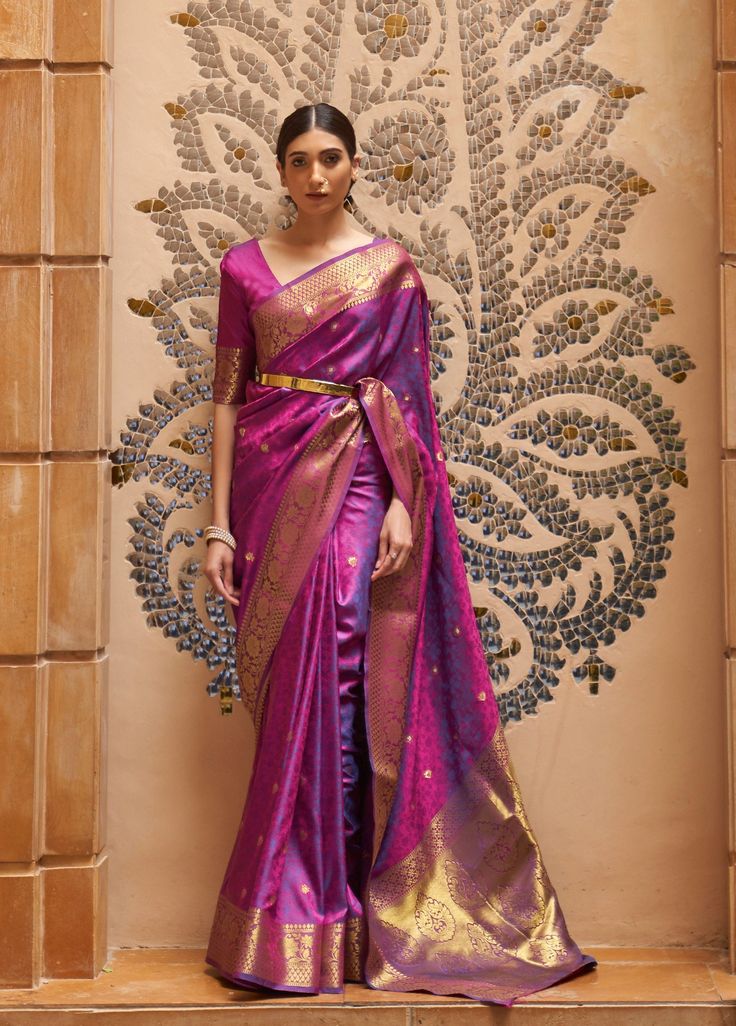 Our custom-made sarees are designed for effortless elegance, tailored specifically for each client. Each saree includes an unstitched blouse piece for personalisation. Featuring pre-pleated pleats and a simple skirt-like draping style, our sarees ensure comfort even during extended wear. The saree is crafted from blended silk and measures 5.5 meters in length, providing ample fabric for various draping styles. Additionally, the unstitched blouse piece, measuring 0.8 meters, can be customised at an additional cost to perfectly complement your saree. The pallu is left unstitched, allowing for versatile styling options--whether you prefer an open pallu or neatly pleated look. Fabric: Blended Silk  Saree Length: 5.5 meters  Blouse Piece: 0.8 meter  Time to Ship: 7 to 8 working days Purple Weave, Lace Saree, Purple Saree, Wedding Saree Indian, Party Kleidung, Art Silk Sarees, Kanjivaram Sarees, Stylish Sarees, Silk Sarees Online