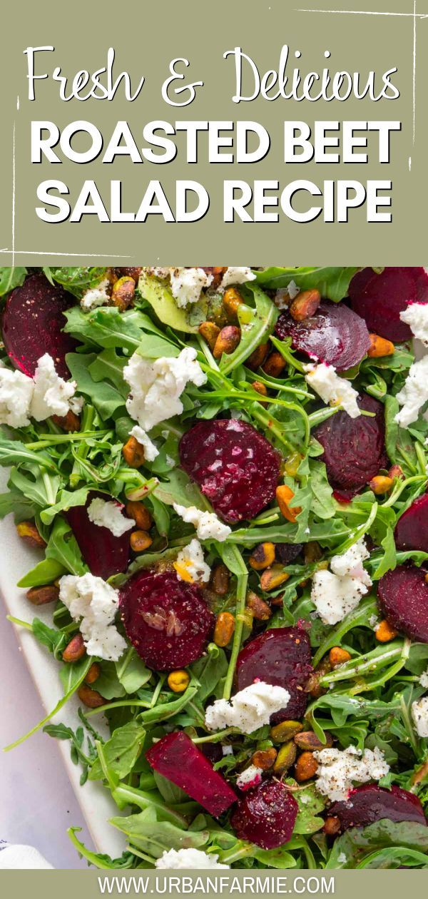 beet salad with goat cheese and pistachio nuts on a white platter