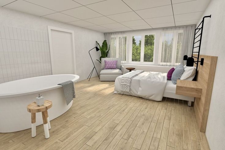 a bedroom with a bathtub, bed and two stools