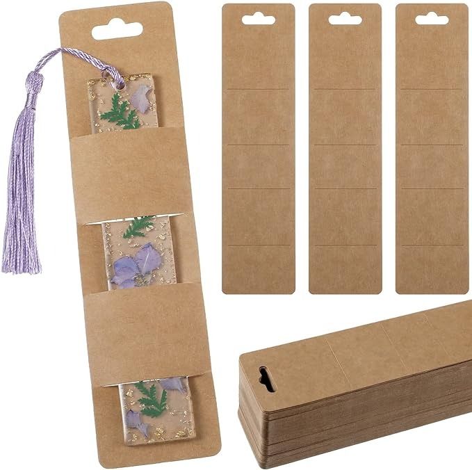 three pieces of cardboard with purple flowers on them and one piece of paper attached to it