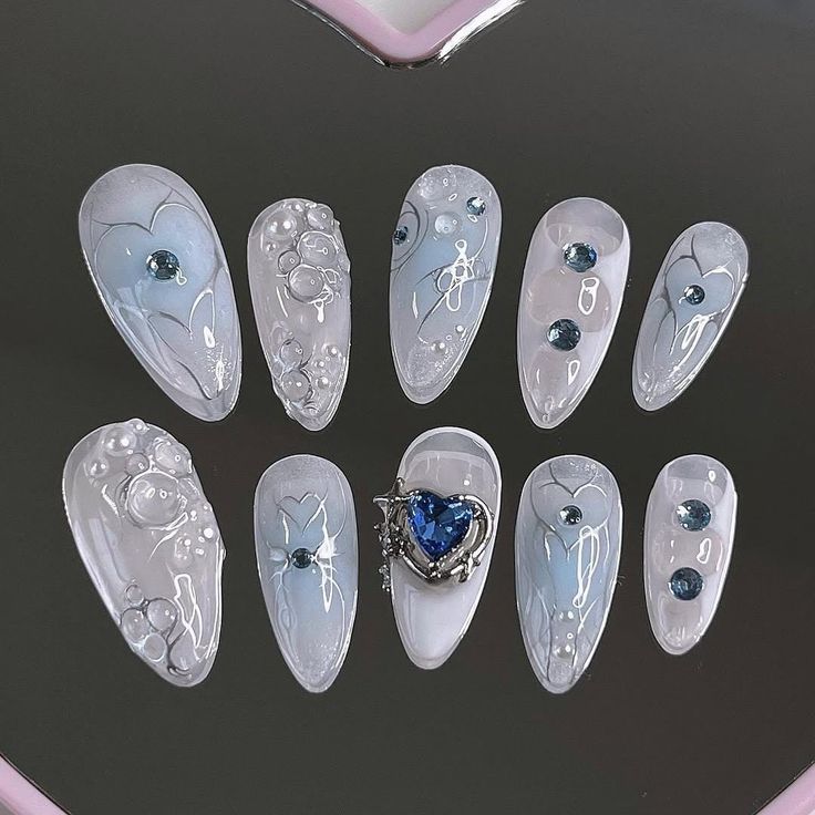 💅🦋 Baby Blue Press On Nails | Custom Press Ons | Version of My Cyber Heart Chrome | Coquette Style Nail | Y2K, Goth, Gothic Nails 🦋💅 Elevate your nail game with our Baby Blue Press On Nails - a mesmerizing set designed to captivate and inspire. Customized to perfection, these press ons offer a unique interpretation of the My Cyber Heart Chrome style, blending elements of Y2K, goth, and gothic aesthetics for a look that's both edgy and enchanting. ✨ Key Features: Baby Blue Elegance: Embrace the serene beauty of baby blue hues, evoking a sense of calm and tranquility. The soft and subtle color palette adds a touch of sophistication to your fingertips, perfect for expressing your unique style. Custom Press Ons: Tailored to your preferences, our custom press ons ensure a perfect fit and fl Ongles Baby Blue, Nail Y2k, Blue Press On Nails, Ateez Concert, Light Blue Nails, Baby Blue Nails, Gothic Nails, Nail Shimmer, Nails Now