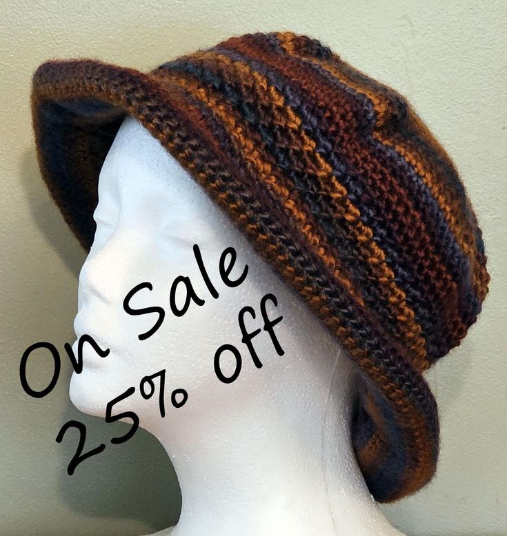 The Brim Beanie is made from Lionbrand Landscapes yarn which is 100% Acrylic and very soft.  The color is shades of blue and brown.  It is made lovingly in a smoke free home.  It is packable for travel or fun for wearing about town.  A good back to school item.  Care instructions are included. Hand or machine Wash, cool water. Dry Flat.  Do Not Iron.   Do Not Bleach. The hat will fit a head circumference of 20"-22" This hat is chemo friendly and made from a pattern by DROPS DESIGN. See other hats in my shop at https://somdesignsandco.etsy.com.  If you like our shop, please link to us at https://somdesignsandco.etsy.com on your favorite social media. Brimmed Brown Beanie For Outdoor, Casual Lightweight Crochet Hat In Brown, Casual Lightweight Brown Crochet Hat, Adjustable Comfortable Hat For Fall, Comfortable Adjustable Hat For Fall, Comfortable Adjustable Hats For Fall, Hand Knitted Brown Hats For Beach, Hand Knitted Brown Hat For The Beach, Adjustable Warm Crochet Hat For Fall