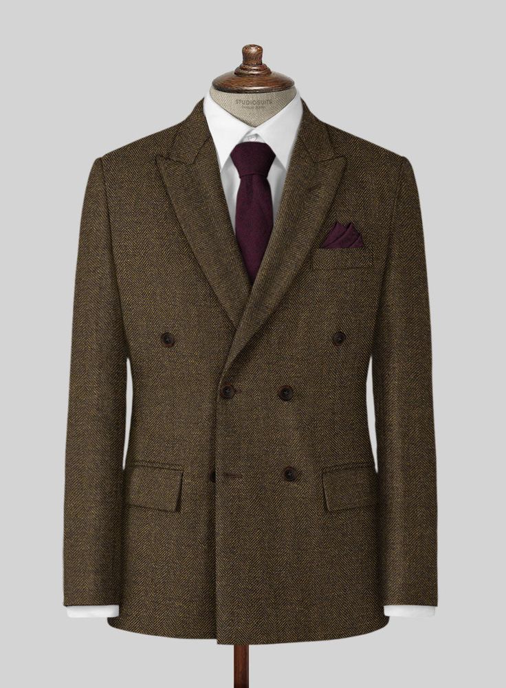 Wish you had an alternative to the countless charcoal grey and navy suits you continually wear to work, social events and weddings? Look no further than our Bottle Brown Herringbone Tweed Jacket Crafted from wool, the brown jacket features a herringbone pattern that brings a breath of fresh air into it, while the tweed fabric makes it a perfect choice for wintry weather. Simply team it up with a white shirt and polished black shoes to achieve this look.  
 
Look Includes   Bottle Brown Herringb Semi-formal Notch Lapel Tweed Jacket, Tweed Suits For Winter Semi-formal Occasions, Winter Tweed Semi-formal Suit, Tweed Jacket For Formal Winter Occasions, Semi-formal Fall Herringbone Suit, Brown Long Sleeve Double Breasted Suit For Business Casual, Semi-formal Brown Double Breasted Suit With Welt Pockets, Brown Double-breasted Suit, Brown Tweed Jacket For Business