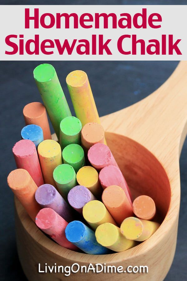 a wooden spoon filled with colored crayons and the words homemade sidewalk chalk