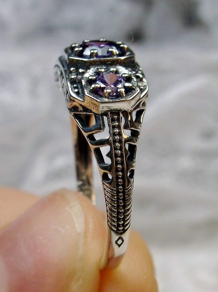 Art deco style ring with three Purple amethyst CZs set in sterling silver filigree Formal Silver Birthstone Ring With Accent Stones, Antique Sterling Silver Promise Jewelry, Antique Sterling Silver Jewelry For Promises, Purple Promise Ring With Intricate Design, Purple Intricate Design Promise Ring, Silver Filigree Ring With Stone Setting For Formal Occasions, Sterling Silver Amethyst Wedding Ring, Silver Filigree Ring For Formal Occasion, Amethyst Rings With Intricate Design For Wedding