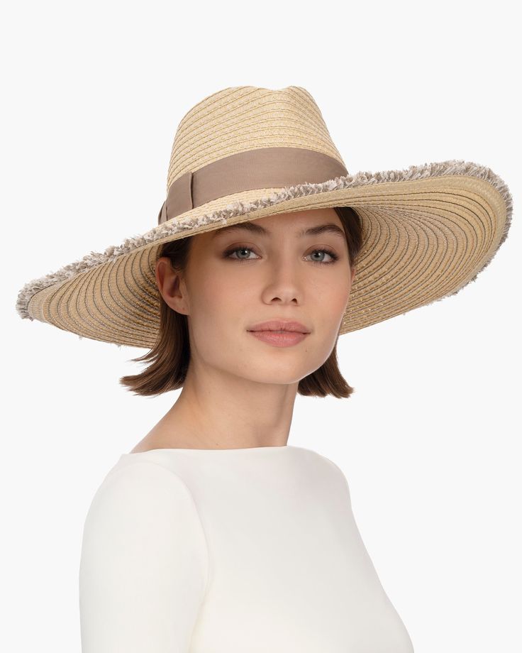 When shopping for a special occasion hat for sale online, Caroline, an elegant wide-brim fedora, will make an impression. It is suitable to wear for a wedding, Kentucky Derby, or an outdoor luncheon. This ever-chic style is made entirely of Squishee®, our unique man-made material, resembling natural raffia, which incorporates recycled fibers. The profile brim is wired beneath the narrow self-fringed edge, sweeping up on one side and gently sloping down on the other, to dramatic effect. A cotton Caroline White, Special Occasion Hats, Cute Summer Outfit, Cotton Ribbon, Wide Brim Fedora, Cute Summer Outfits, Hats For Sale, Fedora Hat, Kentucky Derby