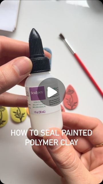 a person holding a bottle of polymer clay with the words how to seal painted polymer clay