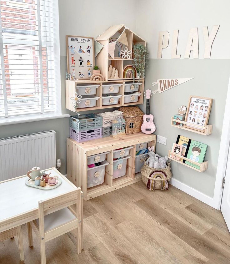 a child's playroom with wooden shelves and toys