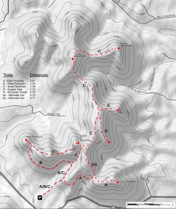 a map showing the route to the top of a mountain with red dots on it