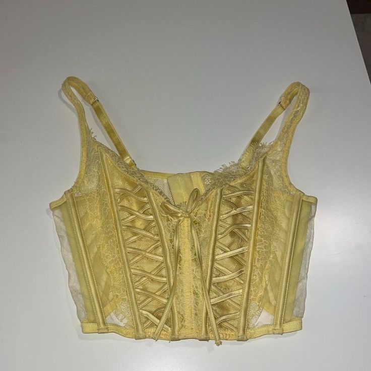 Victoria Secret Bustier Lingerie Corset Top Marked Small New With Tags Yellow Hook Eye Shop Policies Must Be Read Before Purchasing! By Purchasing You Have Agreed To These Terms On My Page Or Linked Here Https://Depop.App.Link/Ppojjjf2cdb #Bustier #Vs #Victoriasecret #Lace #Corset Underbust Bra With Corset Back, Lace Corset With Underwire And Straps, Lace Underwire Corset With Straps, Summer Lace Corset, Bra Friendly, Summer Lace Corset With Bra Friendly Design, Summer Lace Corset Bra Friendly, Party Camisole Corset With Lace Trim, Camisole Corset With Lace Trim For Parties, Party Lace Corset Bra Friendly