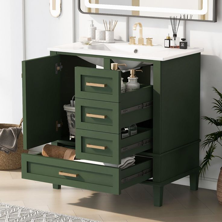 a bathroom vanity with drawers and a sink