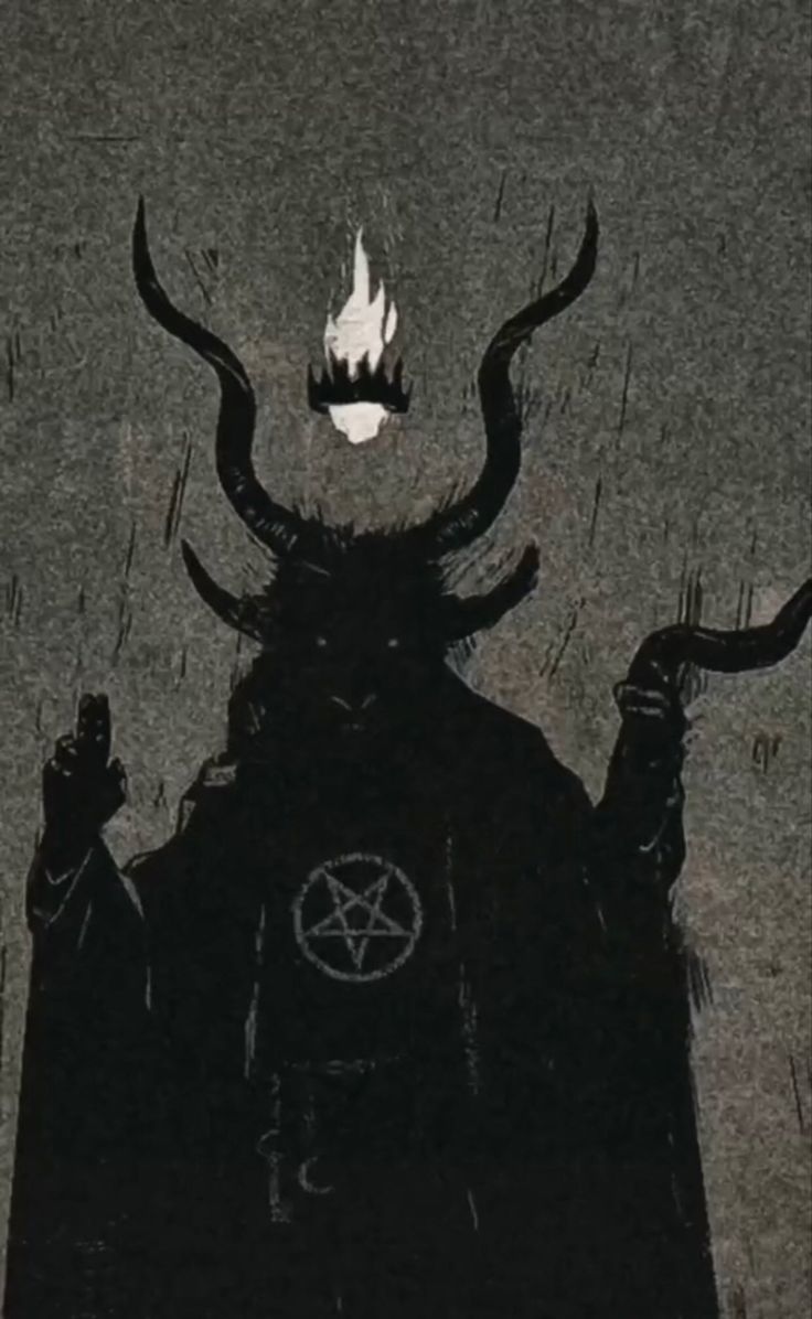 a black and white image of a demon with horns