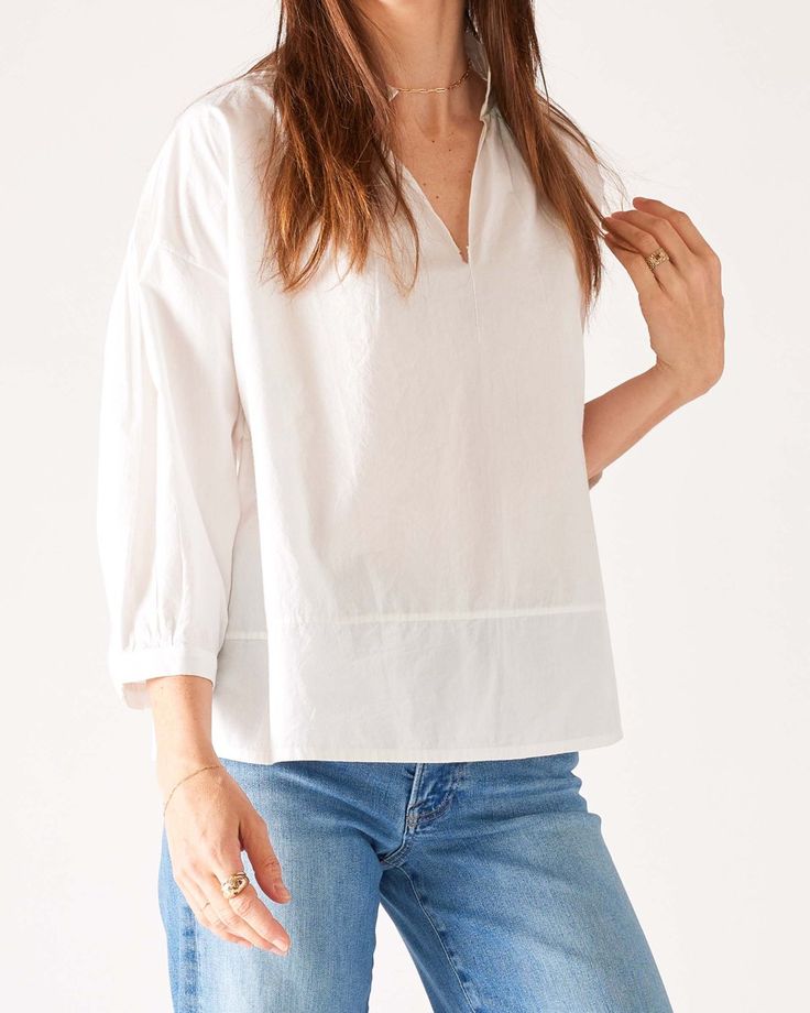 Meet your new favorite blouse—the Sonnet Top. This piece features a gathered v-neckline and a-line silhouette met with elegant blouson sleeves that gather at the cuff for shape. Relaxed Fit V-neck Top For Spring, Fall Tops With Smocked Cuffs And Relaxed Fit, Spring Workwear Tops With Elastic Sleeves, Spring V-neck Top For Daywear, Brunch Tops With Smocked Cuffs And Balloon Sleeves, Balloon Sleeve Tops With Smocked Cuffs For Brunch, Elegant V-neck Peasant Top For Fall, Classic Spring Tops With Bishop Sleeves, Classic Tops With Bishop Sleeves For Daywear