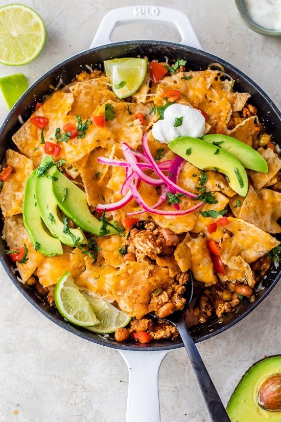 a skillet filled with tortilla and vegetables