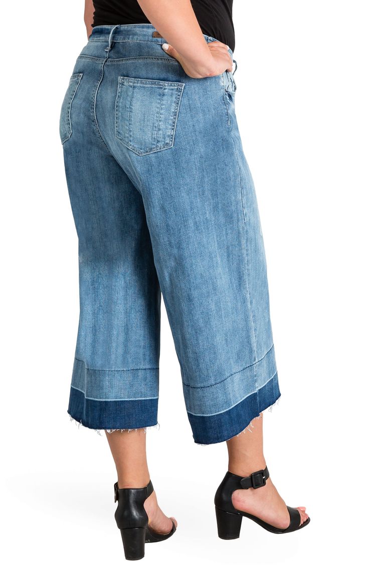 This attention-grabbing hybrid of jeans and culottes is cut from stretch denim with let-out hems for a trend-right twist. Style Name:Standards & Practices Release Hem Denim Culottes (Spruce) (Plus Size). Style Number: 5481422. Available in stores.