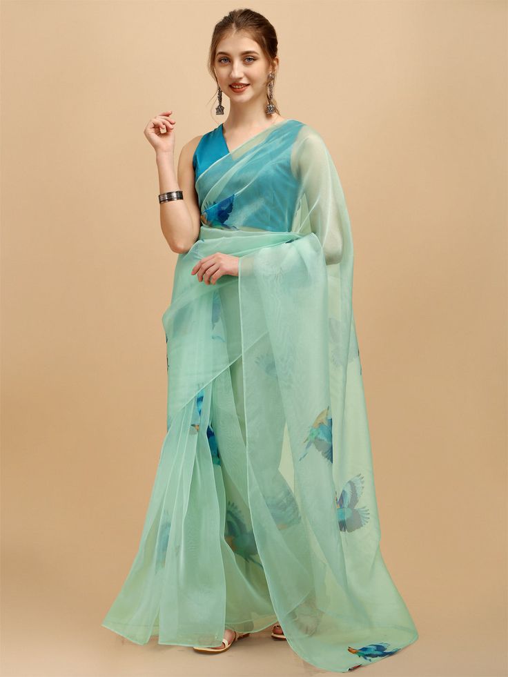 Sea green and blue sareeAbstract printed saree with no borderThe saree comes with an unstitched blouse piece, Check the image of the blouse piece to understand how the actual blouse piece looks like Long Saree Blouse Designs, Blue Organza Saree, Sea Green Saree, Bandhani Suit, Light Sea Green, Saree Painting, Blue Organza, Saree Sale, Saree Floral