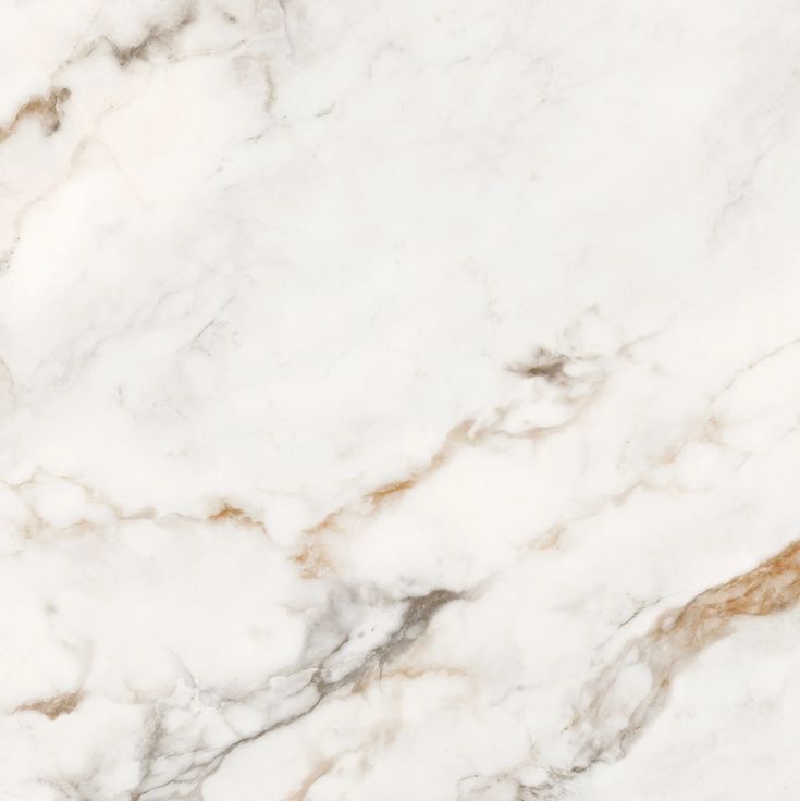 a white marble textured surface with brown accents