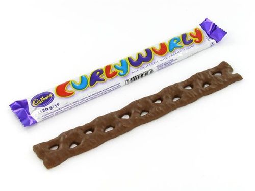 two pieces of chocolate candy sitting next to each other on a white surface with the word crunchy written in it