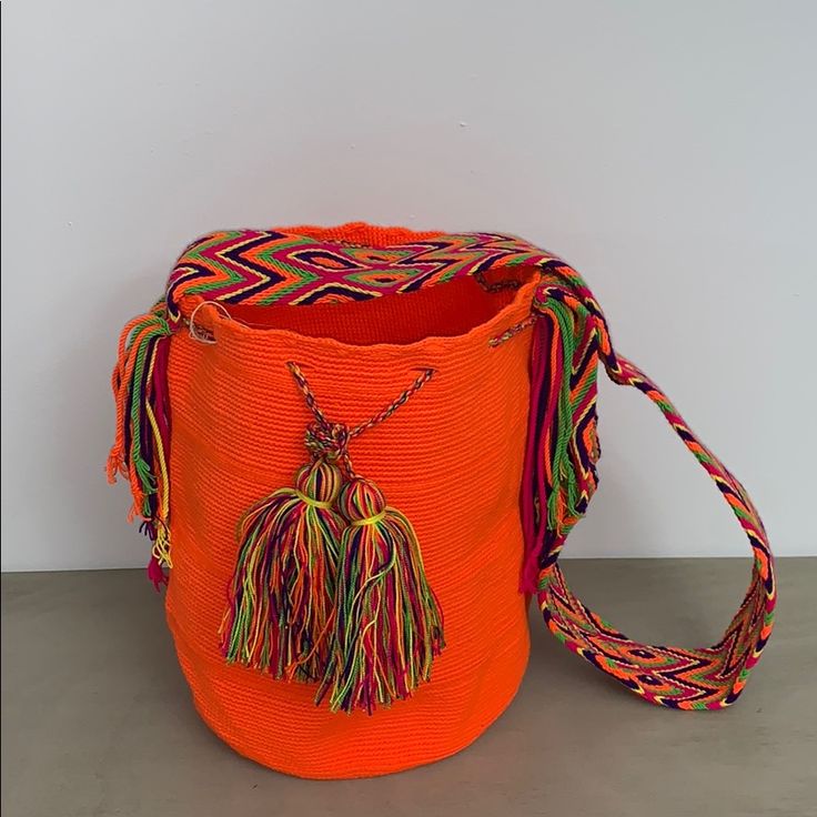 Authentic Wayuu Tribe Cross Body Bag. Vibrant Colors Hand Sown In Colombia. Approximately 11 Inches In Height And 12 Inches Wide. Strap Is 44 Inches In Length (Approx ~21.5 Inches Once You Use It On Your Shoulder). Great For Any Occasion! Orange Crossbody Bucket Bag, Orange Pouch Bag For Travel, Orange Bucket Bag For Travel, Orange Travel Pouch Bag, Orange Bucket Bag For Everyday Use, Everyday Orange Bucket Shoulder Bag, Trendy Orange Bucket Bag, Casual Orange Tote Bucket Bag, Orange Bucket Shoulder Bag For Everyday