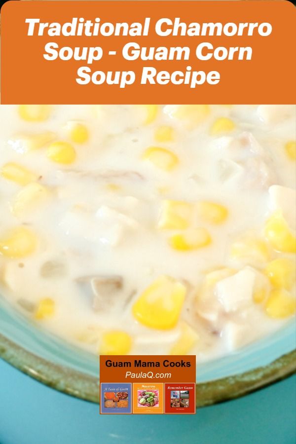 a blue bowl filled with corn on top of a table