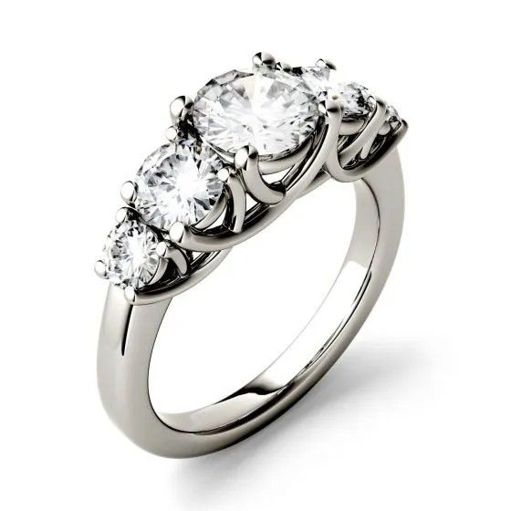 three stone engagement ring with four stones on the side and two diamonds in the middle