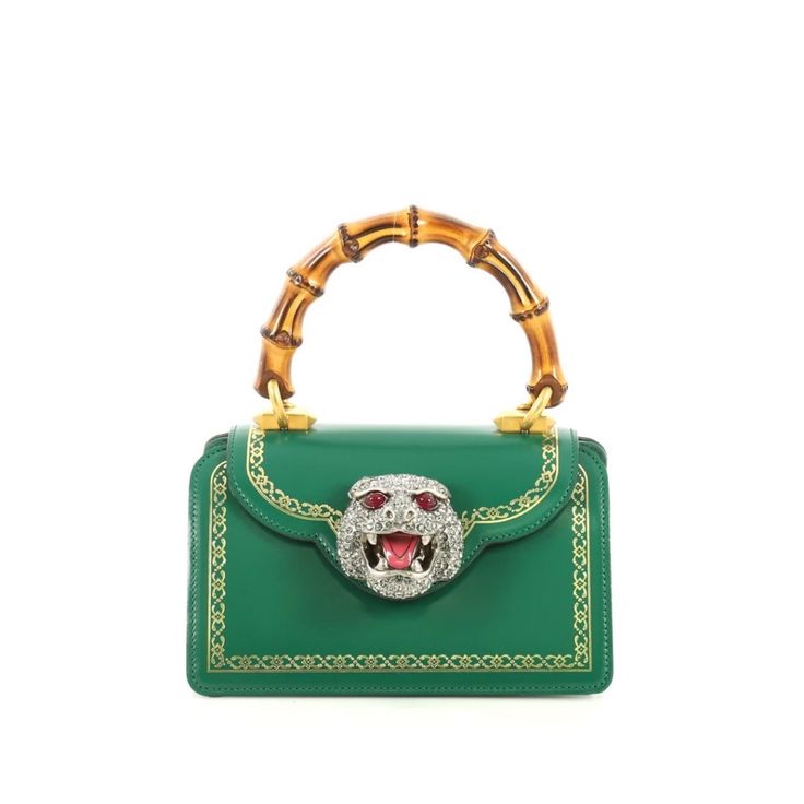 Exterior Color: Green Interior Color: Neutral Print Multicolor Exterior Fabric: Leather Interior Fabric: Satin Hardware Color: Aged Silver, Aged Gold Size And Fit: 7.5”W X 4.5"H X 5.5”D, 3.5” Handle Drop Gucci Thiara Top Handle Bag Frame Print Leather Small Green Gucci Bag With Detachable Handle, Gucci Evening Bags With Top Handle, Designer Handheld Bags With Bamboo Handle, Luxury Crossbody Bag With Bamboo Handle, Luxury Shoulder Bag With Bamboo Handle, Gucci Green Satchel Bag, Gucci Rectangular Bag With Bamboo Handle, Gucci Bamboo Handle Rectangular Bag, Evening Gucci Shoulder Bag With Detachable Handle