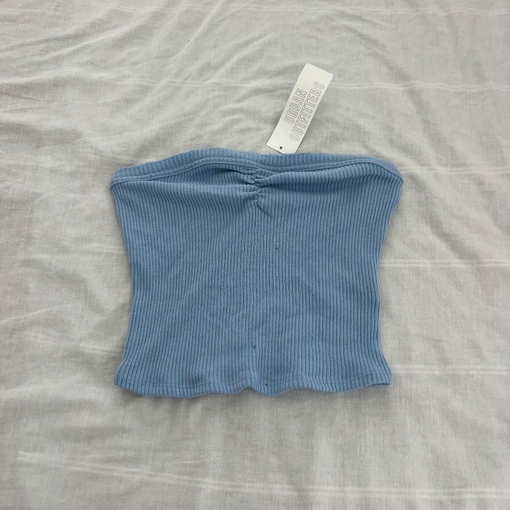 Urban Outfitters Blue Ribbed Tube Top Size Medium Condition: Nwt Color: Blue Details : - Ruched Detail On Front - Sweetheart Neckline - Ribbed - Comfy Extra: - I Ship Between 1-2 Days Cheap Blue Tops From Urban Outfitters, Spring Blue Ribbed Tops, Trendy Light Blue Tops From Urban Outfitters, Light Blue Ribbed Summer Top, Trendy Light Blue Top From Urban Outfitters, Casual Blue Ribbed Crop Top, Blue Trendy Crop Top From Urban Outfitters, Trendy Blue Ribbed Crop Top, Light Blue Fitted Ribbed Top