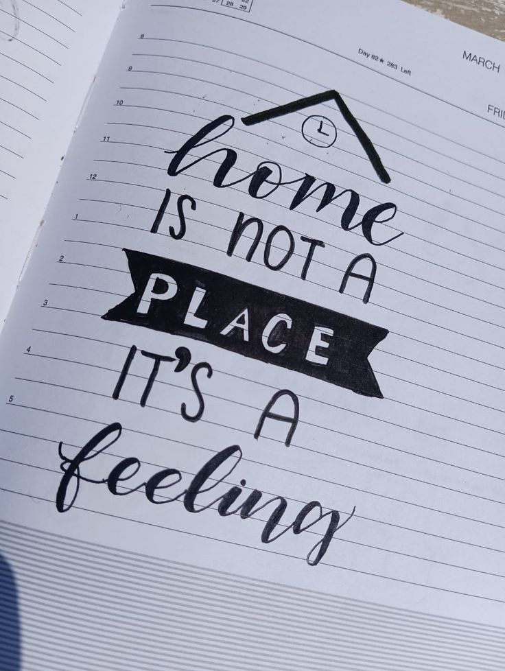 a notebook with writing on it that says home is not a place it's a feeling