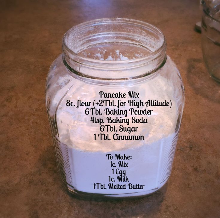 a jar filled with white powder sitting on top of a table