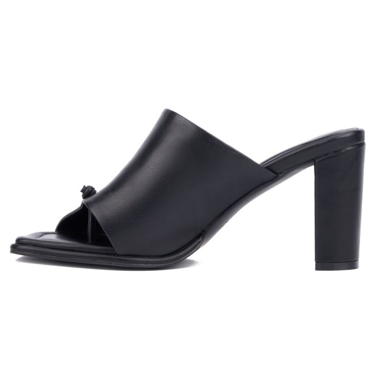 The Darla is your new go to transitional heel, perfect for effortlessly moving between seasons and occasions. Its unique asymmetric open toe design adds a chic and modern touch that complements any outfit. Whether you're dressing up for a special event or adding a stylish flair to your everyday look, the Darla offers both versatility and elegance. Elevate your wardrobe with this sophisticated heel, designed to keep you looking fashionable and on trend year round. Sleek Summer Mules With 4-inch Heel, Elegant Open Toe Mules For Fall, Sleek Spring Mules With Reinforced Heel, Modern Open Toe Mules With 4-inch Heel, Sleek Open Toe Heels With Sculpted Heel, Formal Open Toe Mules For Fall, Modern Open Toe Heels For Night Out, Sleek Mules For Spring Evening, Sleek Sandals With 4-inch Heel For Spring