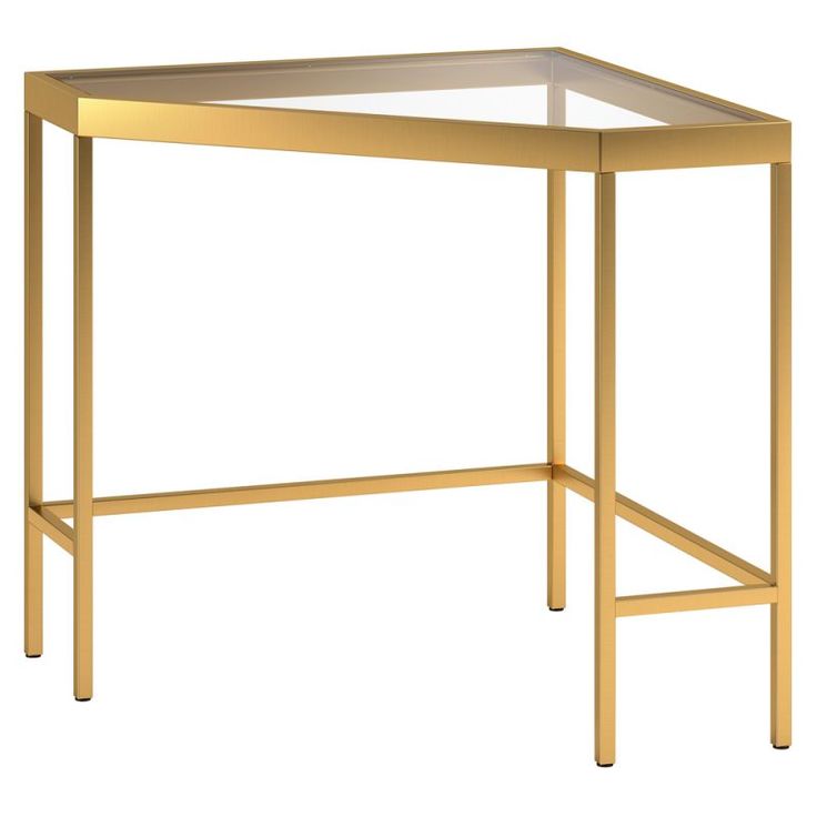 a gold metal and glass desk on a white background