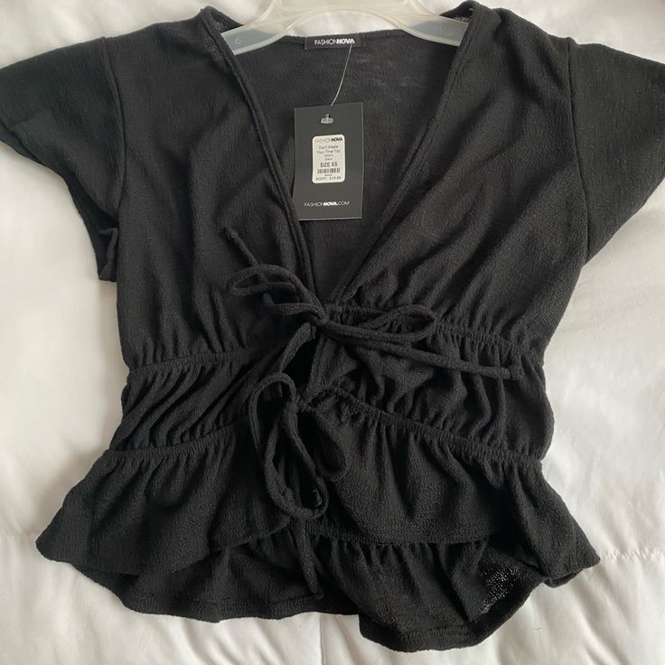 Cute Blouse/Black Top, Never Worn!! Black V-neck Blouse For Beach, Black V-neck Top For Beach, Black V-neck Beach Blouse, Black V-neck Blouse For Day Out, Casual Black Fitted Blouse, Black Beach Tops For Spring, Black Tops For Day Out, Casual Black Blouse For A Party, Black V-neck Summer Blouse