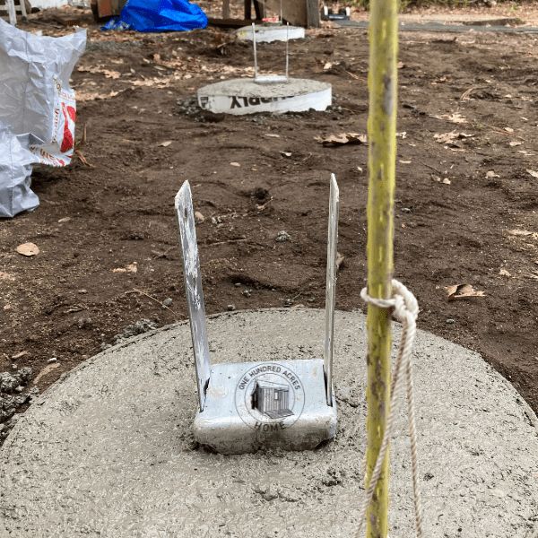 a metal object sitting on top of a cement slab