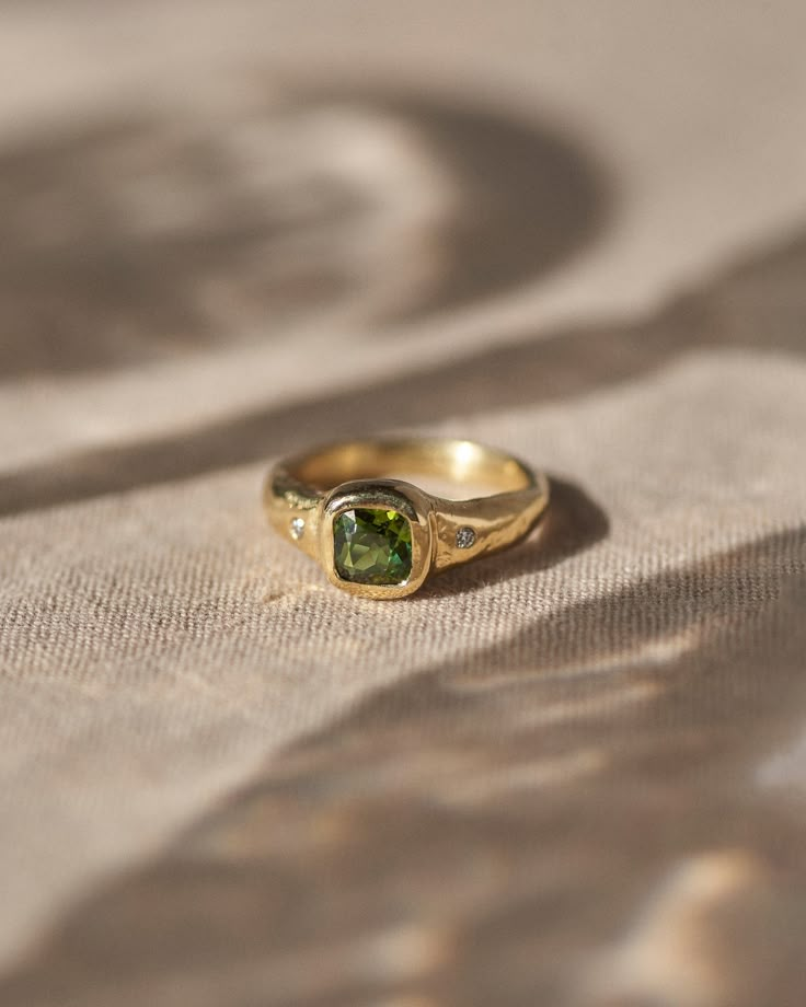 gold band ring with green tourmaline stone Luxury Minimalist Ethical Birthstone Ring, Simple Inlaid Diamond Ring, Dream Ring Stone, Tourmaline Ring Simple, Non Diamond Engagement Rings Catbird, Cool Stone Wedding Rings, Wedding Band Gemstone Simple, Simple Colored Rings Engagement, Lots Of Stone Rings