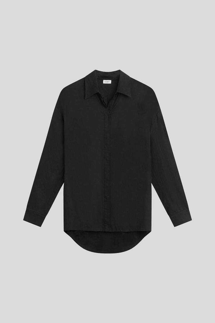 #color_black Modern Oversized Blouse With Button Cuffs, Oversized Button-up Business Top, Oversized Button-up Tops For Business, Modern Oversized Button-up Blouse, Oversized Shirt With Fold Down Collar, Oversized Blouse With Button Closure And Lapel Collar, Oversized Classic Blouse With Concealed Placket, Oversized Business Tops With Button Cuffs, Oversized Business Tops With Button Closure