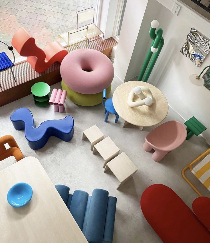 an overhead view of colorful furniture in a room