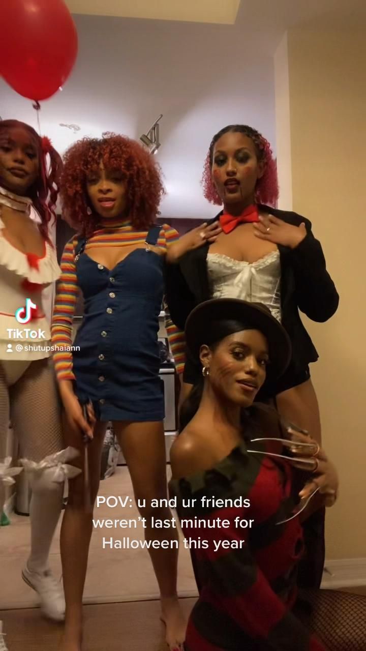 three women dressed in costumes posing for a photo with balloons on the wall behind them that says povu and our friends weren