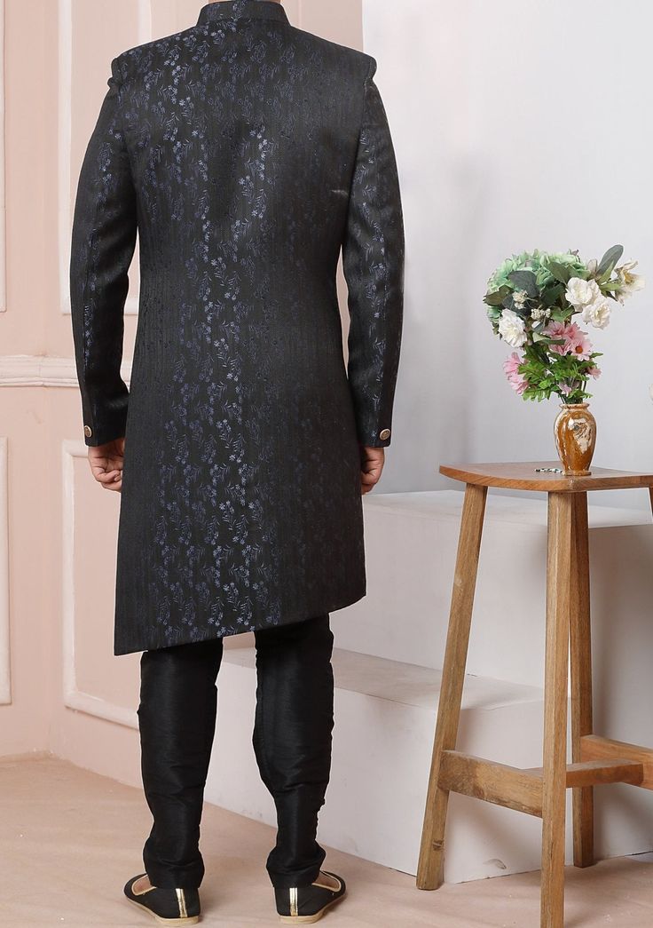 Ready-Made Sherwani With Trouser. Jacquard Brocade Fabric Top. Art Dupion Churidar Ready Made Trouser. Crafted in Chinese Collar Neck, and Full Sleeve. Satin Lining with Plain Work. High-Quality Matching Buttons. Please Note: The footwear shown in the picture is for presentation and photography purpose only. Color: There might be slight color variation due to lightings and flashes while photo shooting. The color may also vary because of different screen resolutions. Wash Care: Dry Clean Only. Western Party Wear, Indo Western Sherwani, Western Party, Western Parties, Chinese Collar, Readymade Saree, Dupion Silk, Collar Neck, Silk Trousers