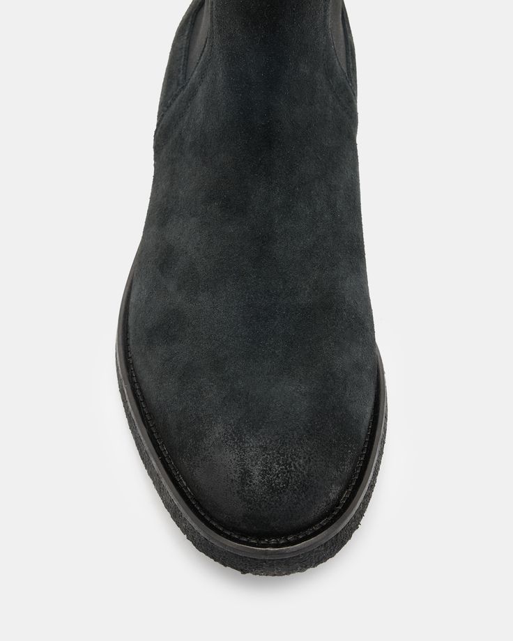 For casual occasions, step out in the Rhett Boots, crafted from soft suede and finished with a crepe rubber outsole. Shaped to a traditional Chelsea boot shape.  These boots fit true to size Round toe Ankle boot Pull tab Chelsea boots Elasticated gusset AllSaints 01-11-94 stamp Suede Moc Toe Boots With Leather Footbed, Suede Boots With Vibram Sole And Moc Toe, Suede Ankle Boots With Vibram Sole, Suede Chelsea Boots With Plain Toe For Fall, Fall Suede Chelsea Boots With Plain Toe, Suede Plain Toe Chelsea Boots For Fall, Suede Ankle-high Boots With Leather Footbed, Rugged Suede Boots With Suede Lining, Suede Boots With Vibram Sole And Plain Toe