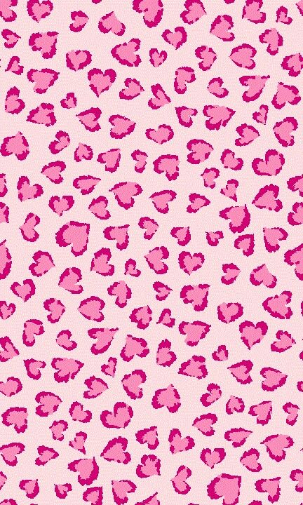 a pink and black leopard print pattern with hearts on it's back ground,