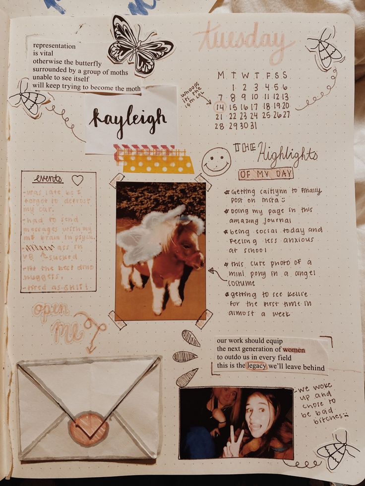 an open scrapbook with pictures and writing on the pages that include photos, letters, and other things