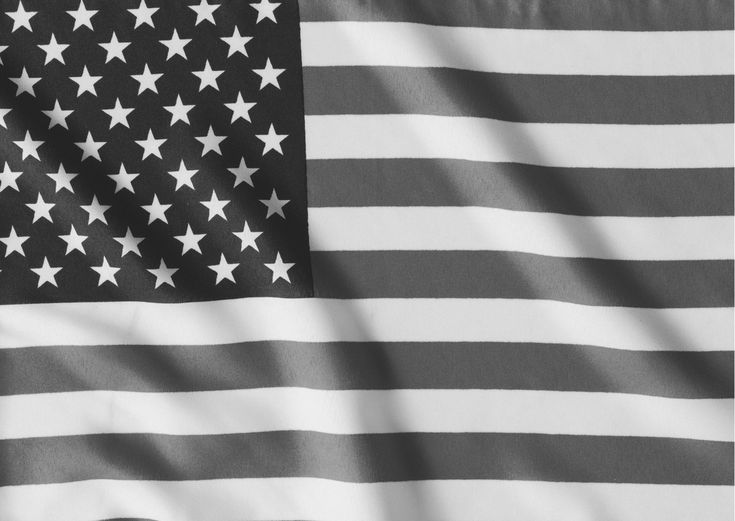 an american flag is shown in black and white