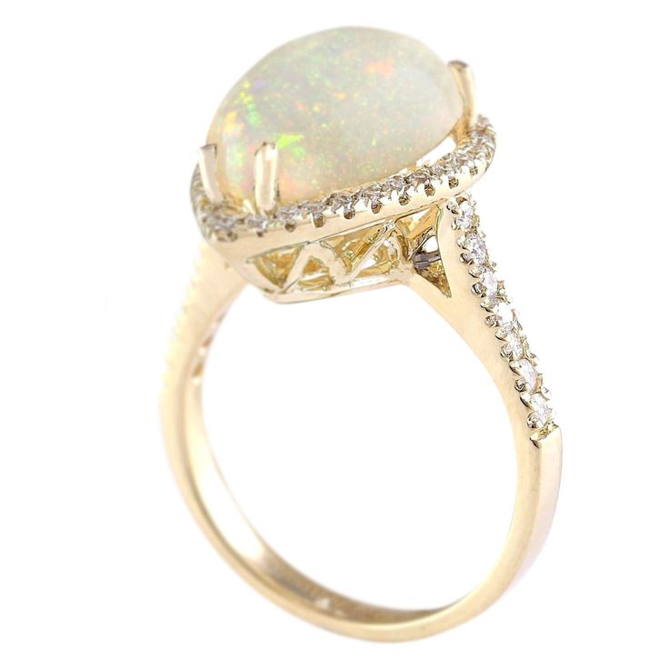 Stamped: 14K Yellow Gold Total Ring Weight: 5.9 Grams Ring Length: N/ARing Width: N/A Gemstone Weight: Total Natural Opal Weight is 4.67 Carat (Measures: 14.80x11.10 mm) Color: Multicolor Diamond Weight: Total Natural Diamond Weight is 0.60 Carat Quantity: 46 Color: F-G, Clarity: VS2-SI1 Face Measures: 18.95x14.10 mm Sku: [703967W] Luxury Yellow Gold Opal Ring With Accent Stones, Oval Multi-stone Yellow Gold Rings, Oval Yellow Gold Multi-stone Rings, Formal Gold Halo Birthstone Ring, Yellow Gold Opal Diamond Ring, Luxury Gold Opal Ring With Center Stone, Luxury Yellow Gold Opal Ring With Halo Setting, Gold Opal Ring With Center Stone, Luxury 14k Gold Opal Ring With Prong Setting