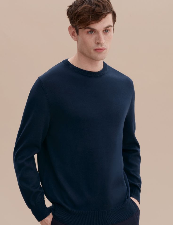 Our Cotton Knit Sweater is a necessary contemporary basic with impeccable quality; the timeless design will endure season after season. The mid-weight material makes the piece perfect for a range of climates - wear it as a layering piece over a shirt in Fall and under a coat in cooler months.

A mid-weight knit made from our premium Flamed Mercerized Peruvian Pima cotton yarn, which gives the piece its lustrous appearance. The Mercerization process also increased fiber strength and affinity to d Spring Merino Wool Top With Ribbed Collar, Fine Knit Cashmere Outerwear, Classic Fine Knit Outerwear For Work, Casual Merino Wool Outerwear For Everyday, Casual Everyday Merino Wool Outerwear, Everyday Cashmere Outerwear With Ribbed Cuffs, Classic Long Sleeve Fine Knit Outerwear, Relaxed Fit Fine Knit Outerwear For Layering, Classic Long Sleeve Outerwear With Ribbed Cuffs