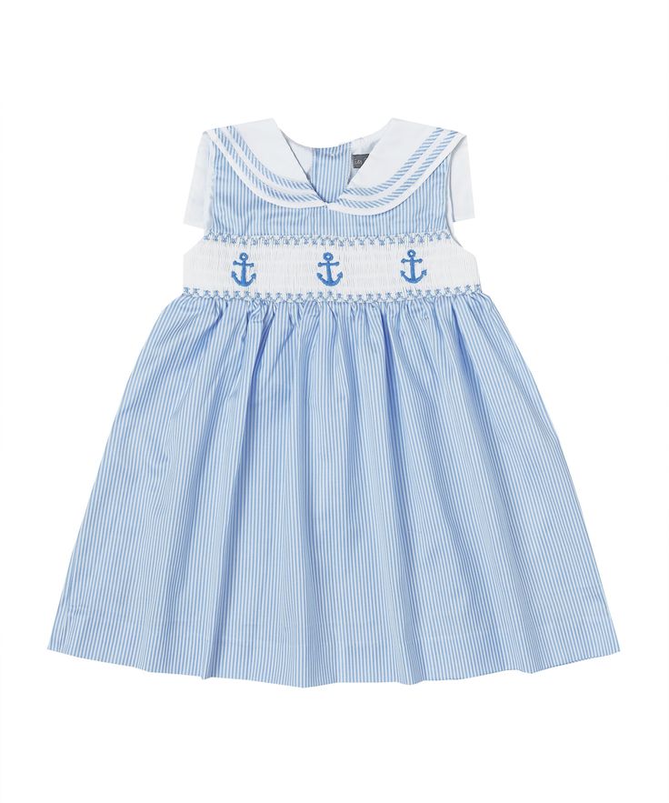 Style # PS-TM1103  Hand smocked anchor blue stripe sailor dress  Made with 100% Cotton Blue Sailor Cotton Dress, Blue Cotton Sailor Dress, Blue Sailor Style Cotton Dress, Sailor Style Blue Cotton Dress, Nautical Navy Cotton Dress, Navy Nautical Cotton Dress, Navy Cotton Nautical Dress, Navy Marine Style Summer Dress, White Sleeveless Nautical Dress