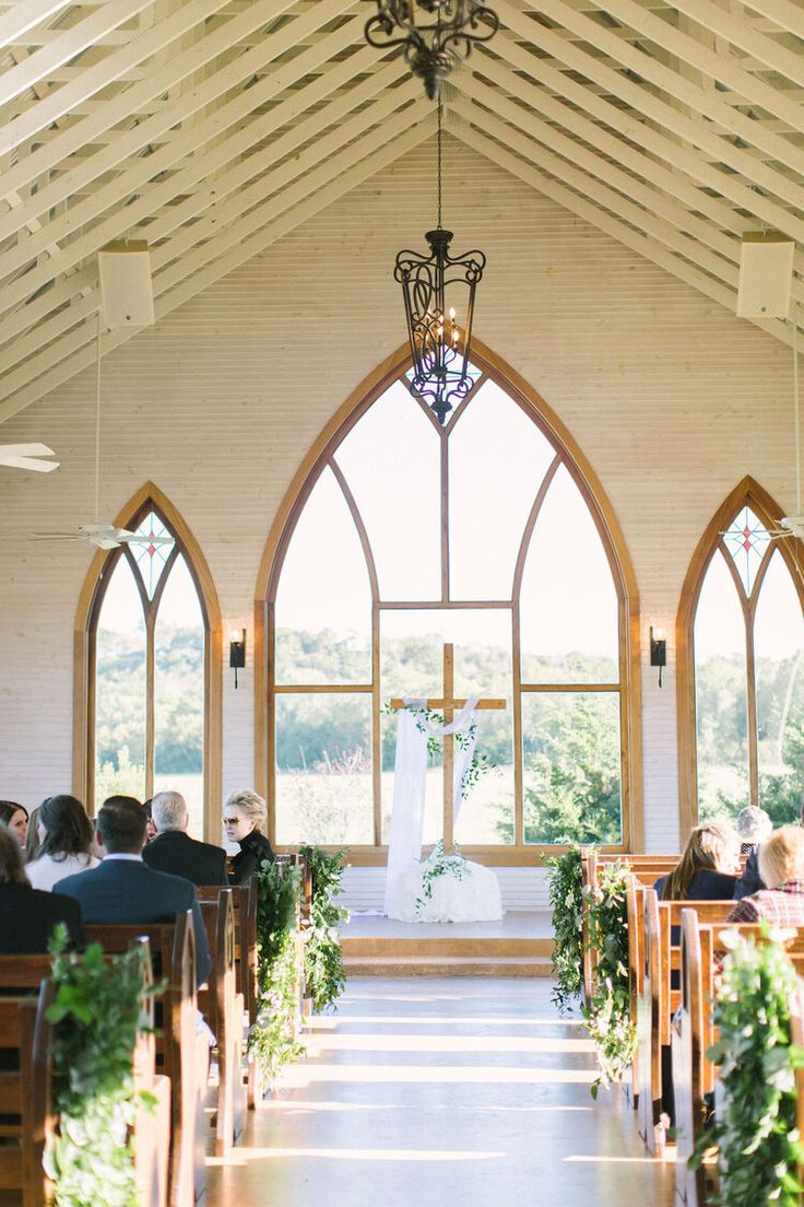 the bride and groom are getting married at the alter