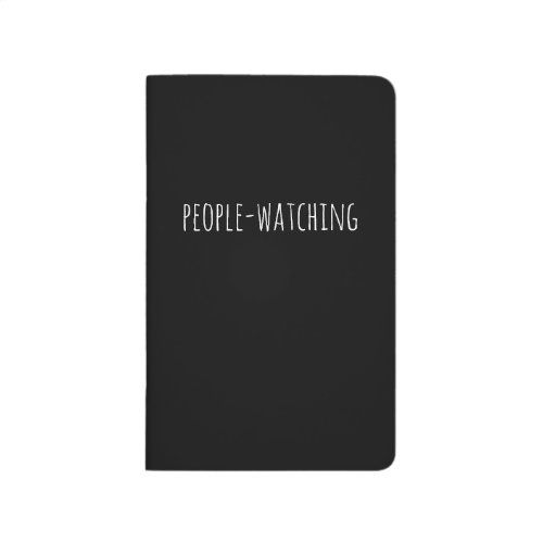 the evil plans, etc notebook is shown in white lettering on a black cover with silver foil