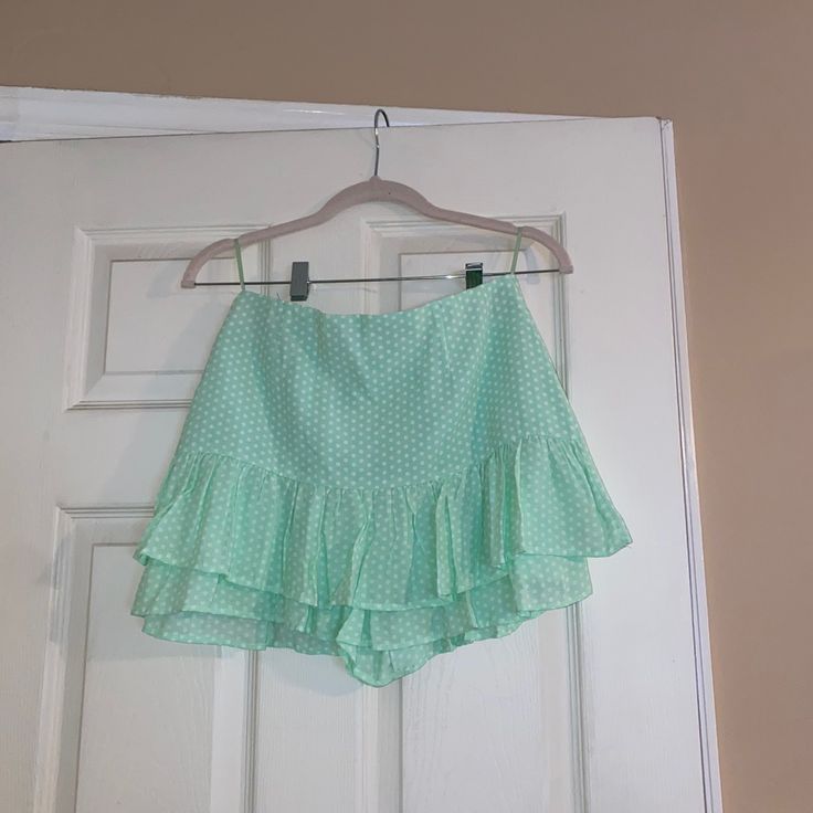 New + Tags On Mint Green Polka Dot Skirt With Shorts Built In Zipper On The Side Size S Chic Green Tiered Skirt, Green Flowy Skirt For Day Out, Green Skirted Bottoms For Spring, Spring Green Skirted Bottoms, Green Casual Skort (shorts Skirt), Casual Green Skort (shorts With Skirt Shape), Zara Tiered Skirt For Vacation, Green Lined Skirt For Summer, Green Short Skirt For Summer