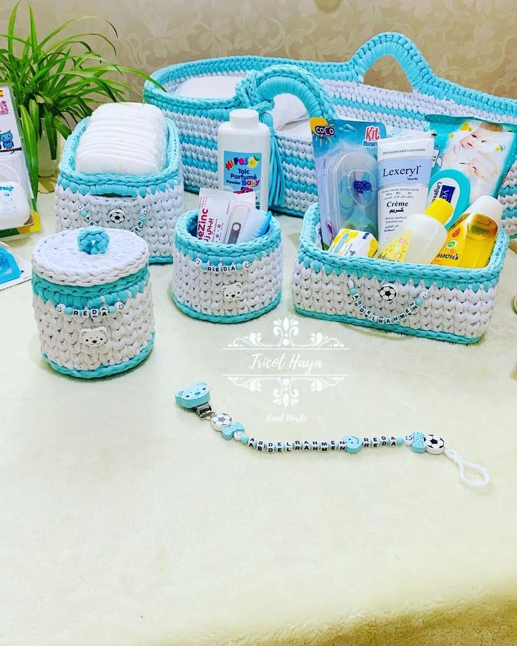 a table topped with blue baskets filled with personal care items