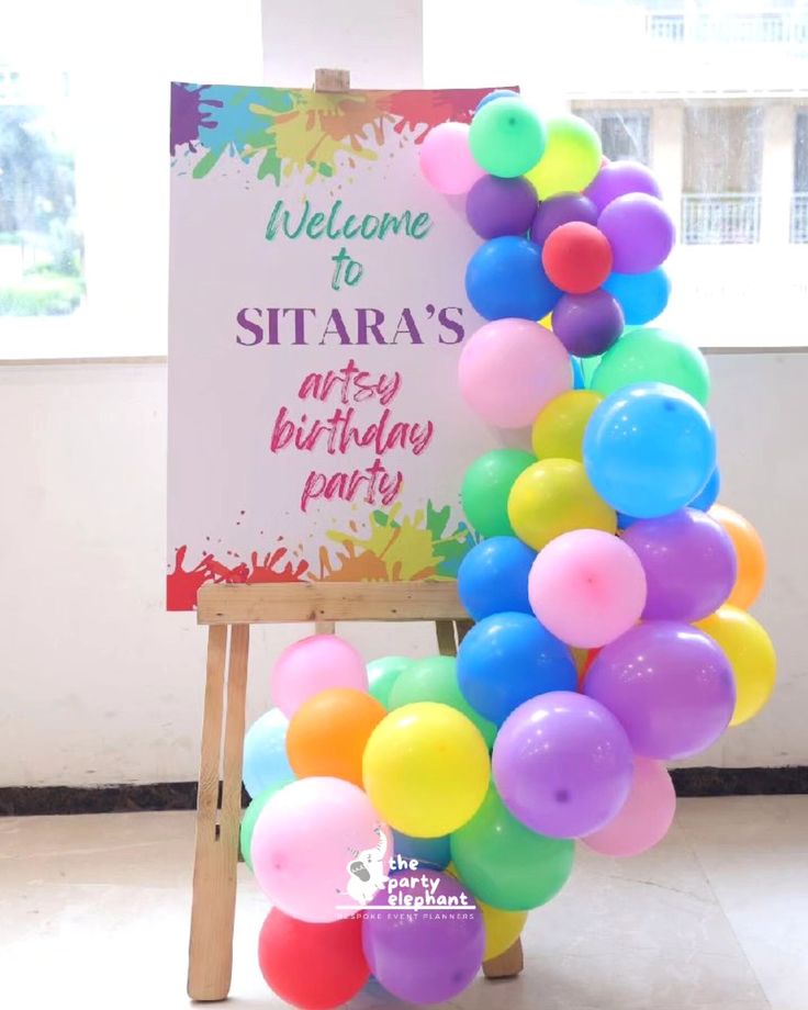 there is a sign that says welcome to sitara's arty birthday party